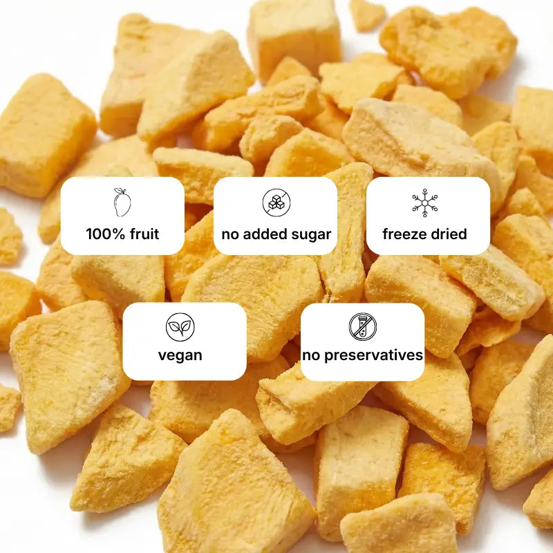 Freeze-dried mango slices nutrition benefits showing 100% pure fruit, no added sugar, vegan, and no preservatives